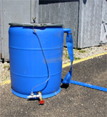 Side view of rain barrel sold by LSWCD